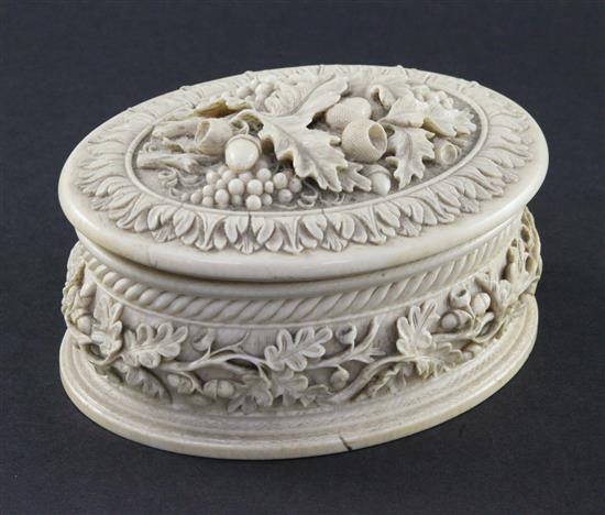 A 19th century oval carved ivory table box, 5.5in., some faults